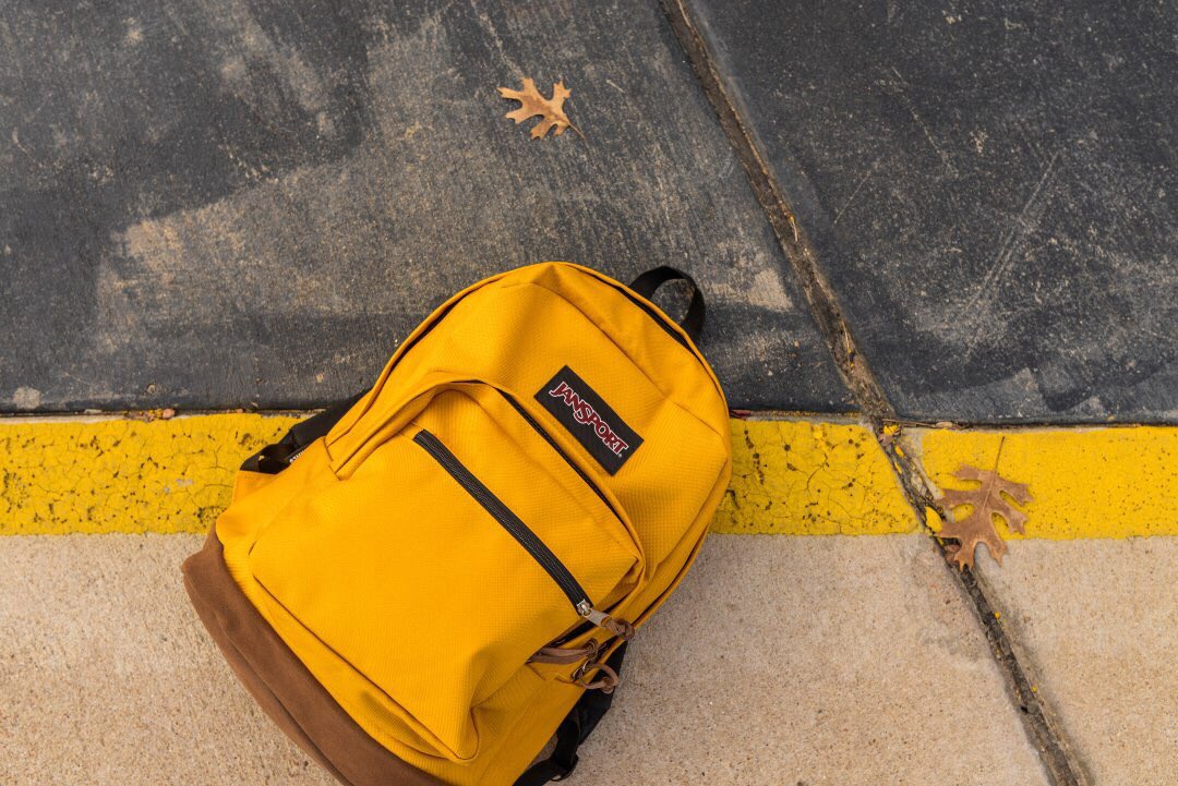 mustard yellow jansport