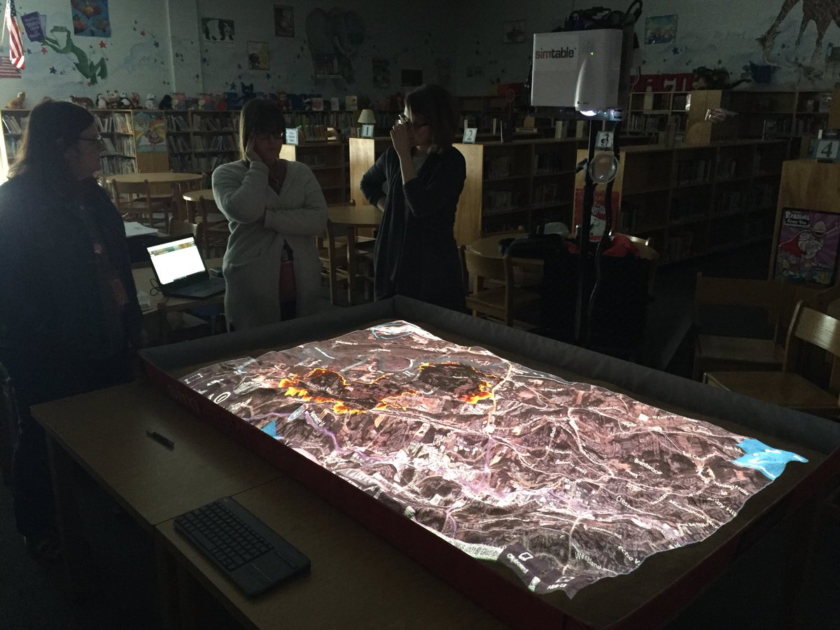 mcamponovo's tweet photo. Teachers at Hardin Valley brainstorming on data and simulation ideas for @Simtable classroom use. Requests for imagery from diff decades to show urban growth and sea level rise already. https://t.co/AMftveklt9