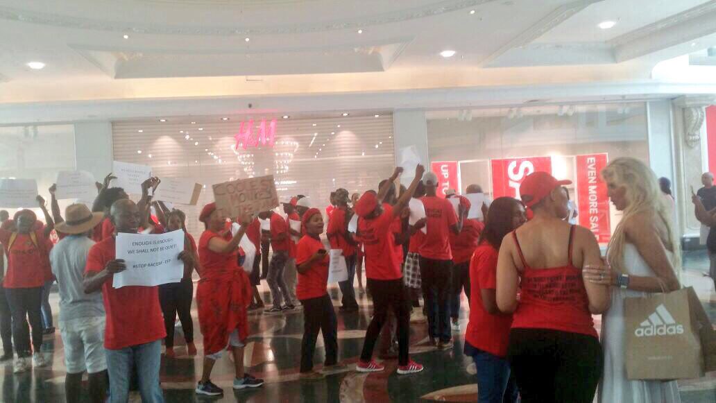 AthiMtongana's tweet photo. Happening right now in Century City, Cape Town. Protests outside the store, inside Canal Walk mall. #hmProtest #HM #hm @enca https://t.co/SI7S0qqq1A
