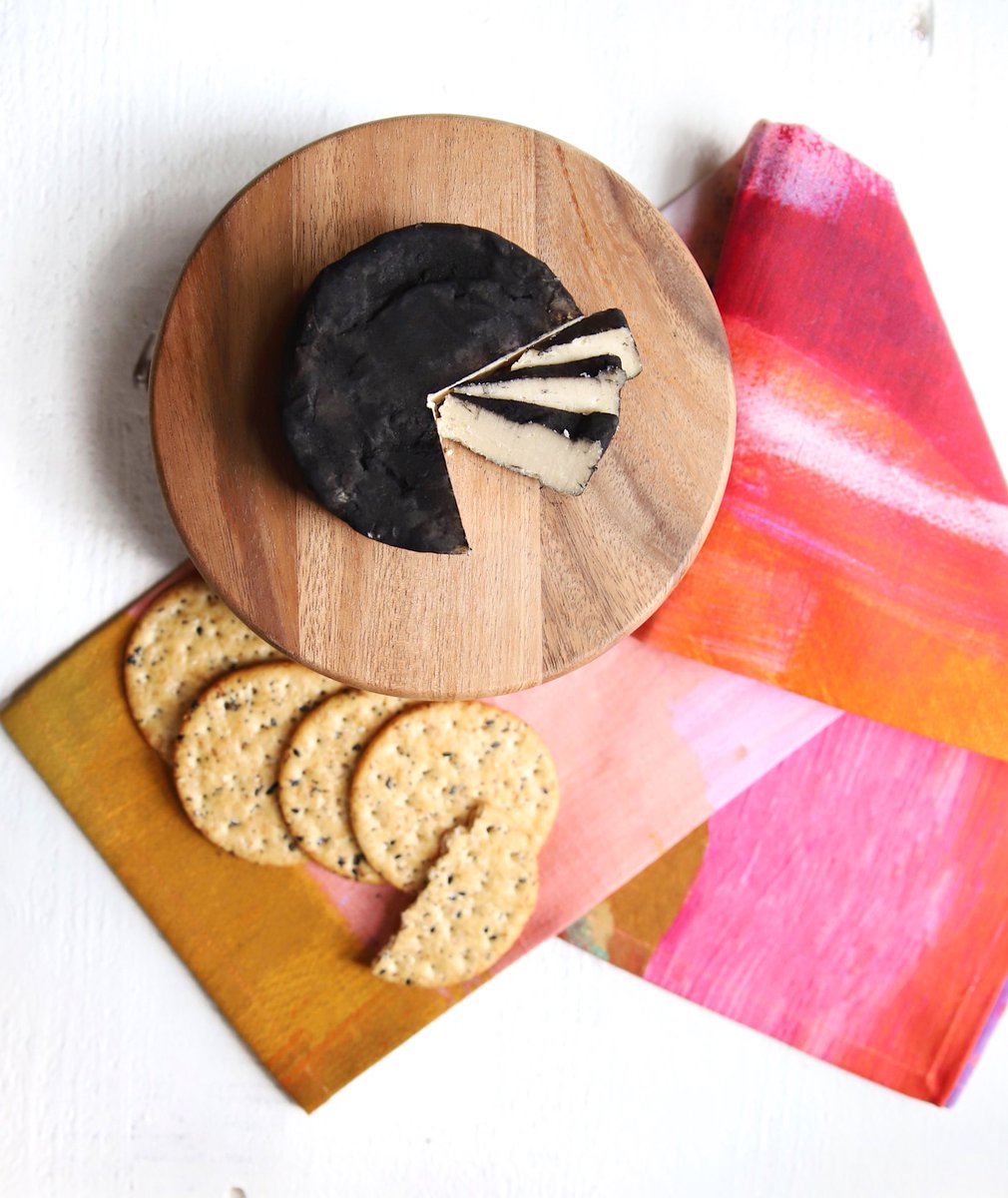 CHOW DOWN ON CASHEW CHEESE | We now have a few wheels of our Black Onyx Cashew Cheese back in stock! Find it, along with the Garlic &amp; Chive, at Regional Farmers Market this morning or @7thpublicmarket.