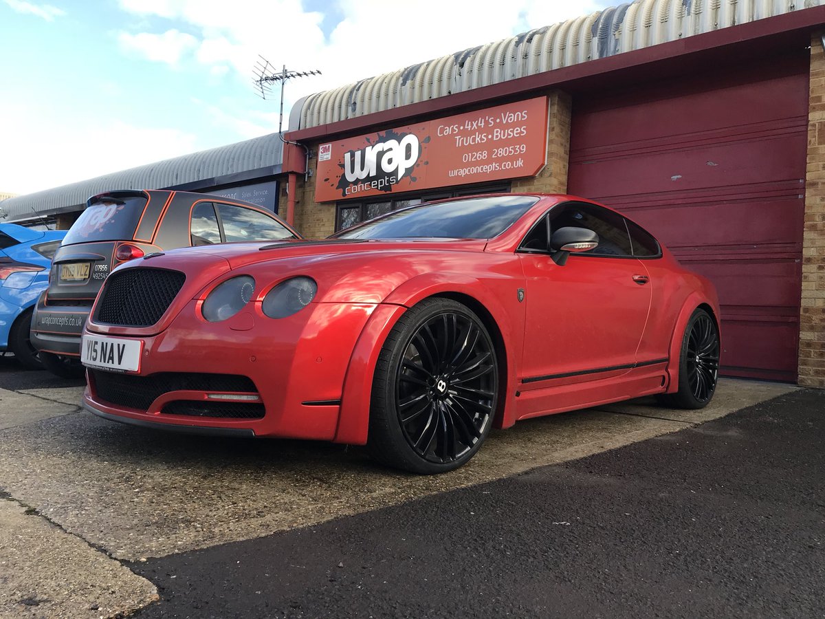 Bentley continental wrapped in #3M dragon fire red with carbon details and wheels powder coated gloss black. Body kit also fitted.