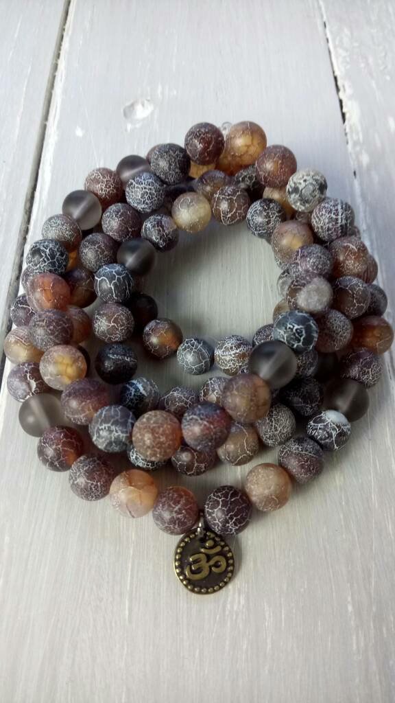 #malabeads #yogajewellery #bracelet #giftforher #giftforyogalover Excited to share the latest addition to my #etsy shop: 108 Wrist Mala Beads with Brown Fire Crackle Agate, Smoky Quartz, OM Charm, Protection, Yoga Fashion, Meditation Jewellery, Yoga Lovers etsy.me/2Dr6q4t