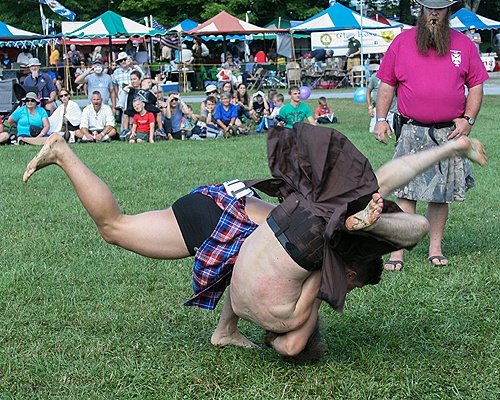 GMHGames's tweet photo. Kilted Highland Wrestling at the 2017 Games, captured by James Shaffer https://t.co/CbpdQ3MAaK https://t.co/LPhj67tj1X