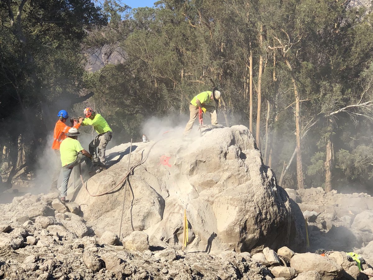 #CAstorm- Demolition workers break down boulders Sunday afternoon that are scattered throughout Montecito following the deadly mud, rock, and debris that struck the area following heavy rains on January 9.