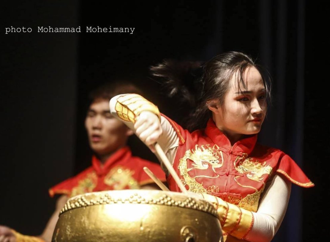 mystealthyorg's tweet photo. This woman was invited from China to participate in Fajr Festival. Look how humiliating it is when in the middle of her performance agents emerge from behind the curtains and cover her head with a black piece cloth because her headscarf has slipped off her head!
#WhiteWednesdays https://t.co/9QP06ysl25