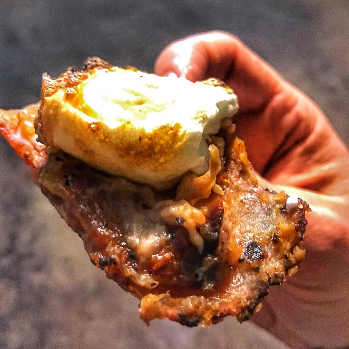 Hog skin s’mores by <a href="/BBQsnob/">Daniel Vaughn</a>. 

Crispy skin off whole hog topped with roasted marshmallow FTW!