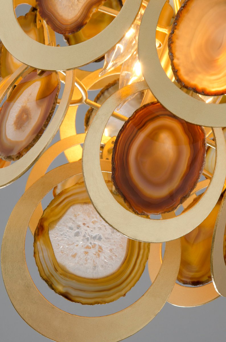 Corbett Lighting's Rockstar pendant is created from natural Brazilian agate slices in rich sunset hues hanging from a handcrafted frame finished in gleaming gold leaf. ✨ #corbettlighting
