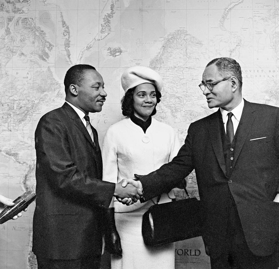 untribune's tweet photo. Dr. King and his wife Coretta visiting UNHQ in 1964, greeted by Ralph Bunche, USG for political affairs. https://t.co/7F8ncfjgC2