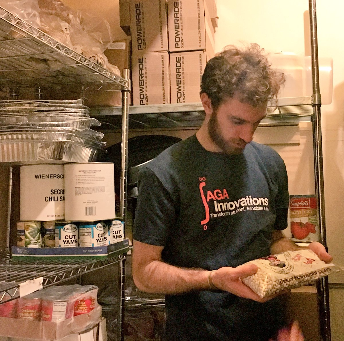 SagaEducation's tweet photo. #SAGAserves at North Side Housing &amp; Supportive Services in #Chicago. Today we’re organizing food in the pantry! #MLKDay2018 https://t.co/5CrYcb4k6c