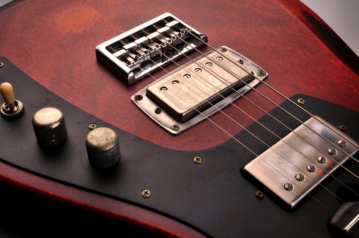 TennesseeElec's tweet photo. Antique solid mahogany body, a solar black powder coated aluminum pickguard, and aged chrome hardware. Be Driven. https://t.co/w2RN9GqVur