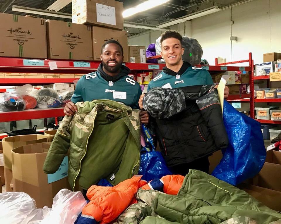 C2CPhiladelphia's tweet photo. Fresh off a big playoff victory, Philadelphia @Eagles players @TorreySmithWR, @MackHollins, @DonnieJones and Steven Means stopped by The Giving Factory to volunteer for #MLKDay!
#Philly #PHL https://t.co/Vxl3RasJOR