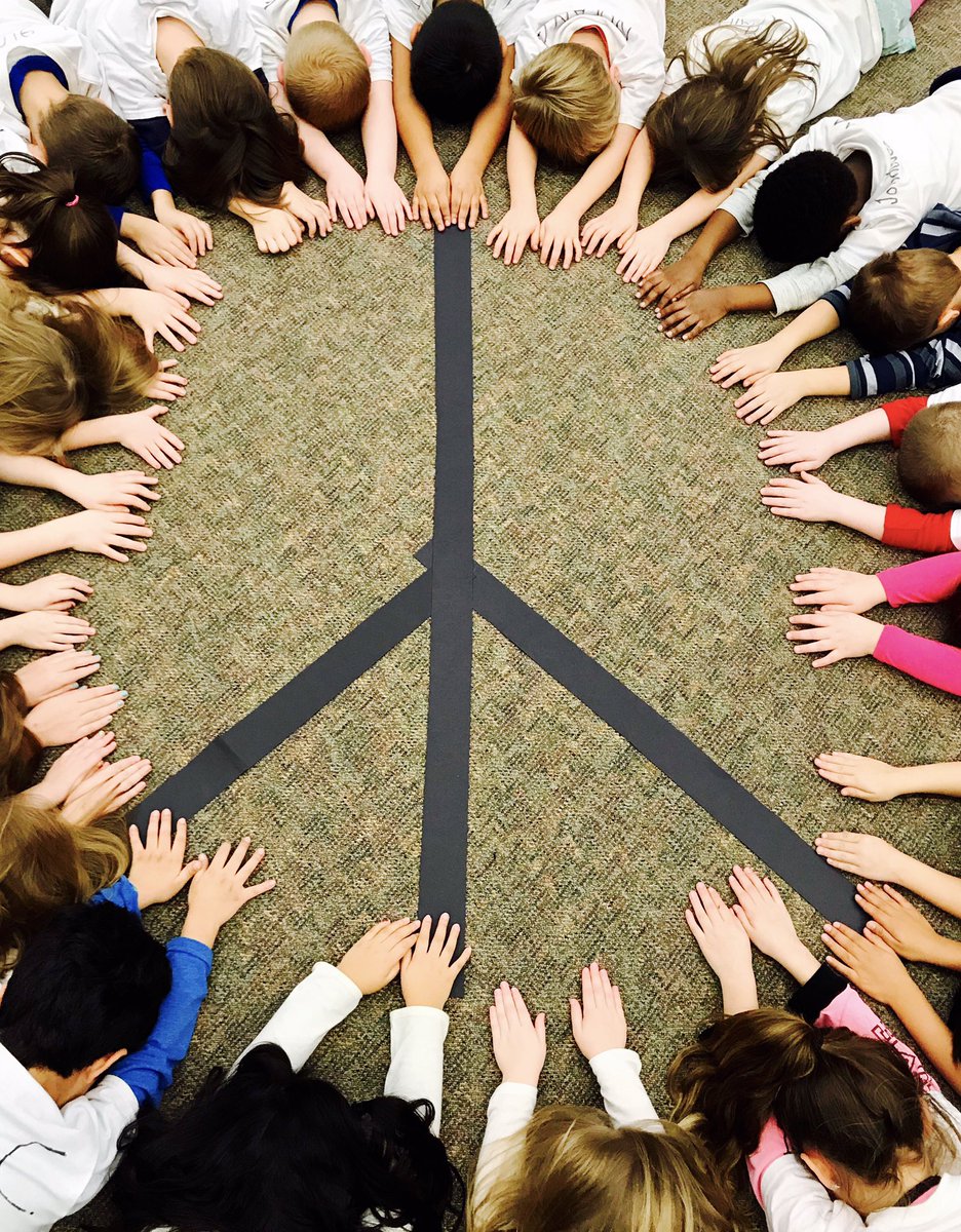 Working together to make a peace sign☮️ <a href="/IndianPrairie47/">Indian Prairie D47</a>