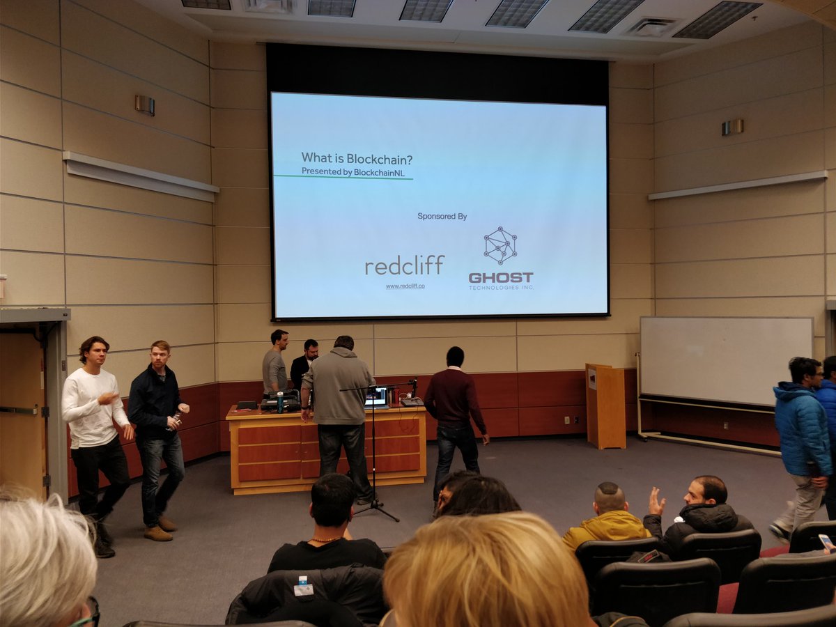 LiamCFlanagan's tweet photo. Excited to learn more about blockchain with #BlockchainNL! Packed house at the Bruneau Centre tonight https://t.co/OHP3R3aMs3