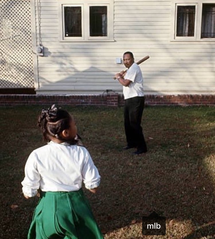Dr. King and his daughter playing some baseball.