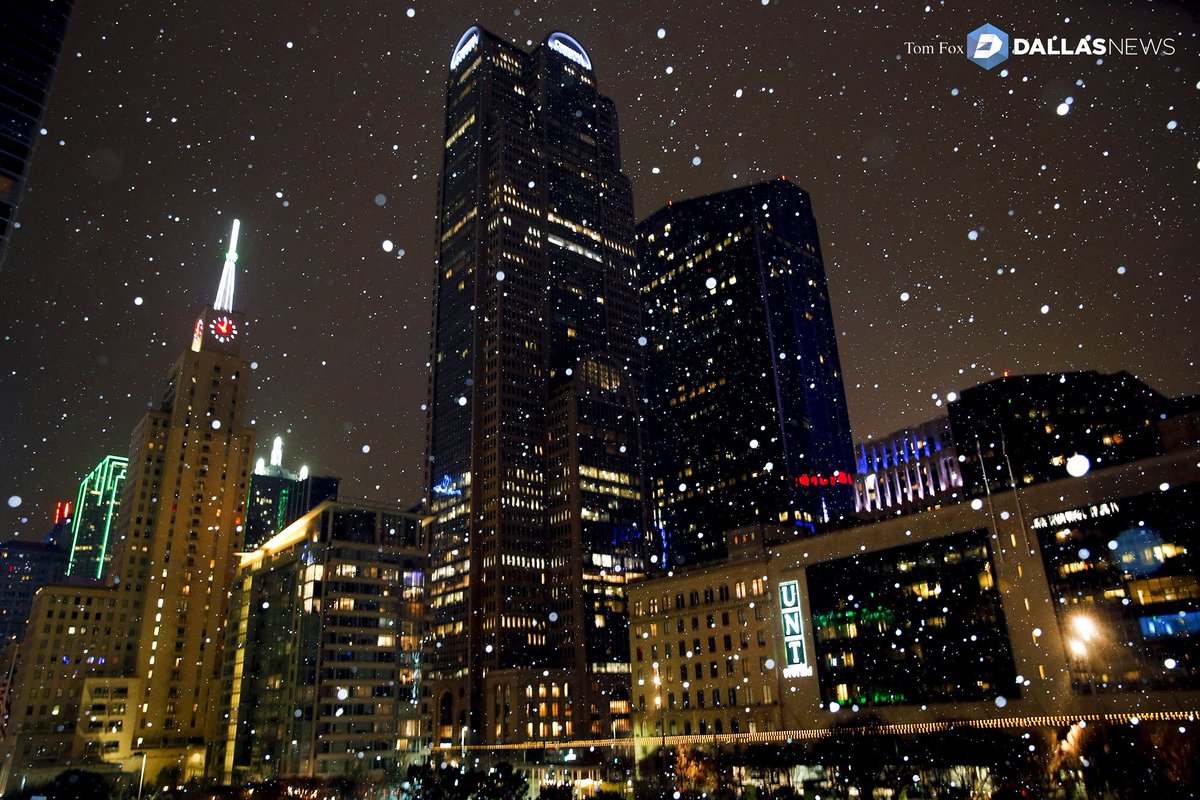 dallasnews's tweet photo. For a few minutes at 10 pm Monday, downtown Dallas looked like the inside of a snowglobe. 

📸 @TomFoxPhoto https://t.co/AIZpuMh5oq