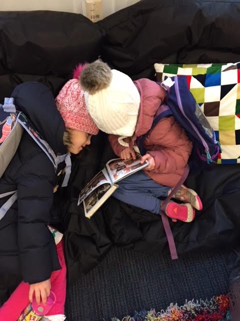 LatinLibrarians's tweet photo. The lower school is exploring peace in honor of MLK this month. We asked students to take pictures of what peace looks like in the library. https://t.co/TIobazF3L8