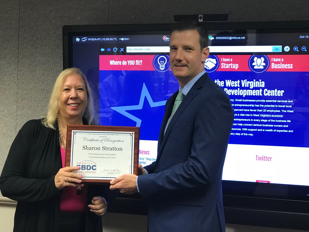 WVSBDC's tweet photo. #WVDevelopmentOffice Executive Director Kris Hopkins recognized #WVSBDC Coaches Mary Hott and Sharon Stratton for having the most total number of training attendees in Fiscal Year 2017. #ShopSmallWV https://t.co/7wWmi9dqAV