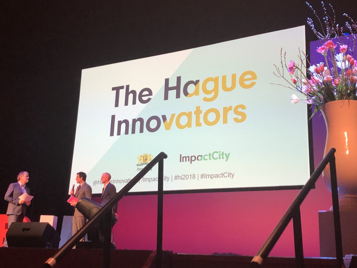impactcity's tweet photo. Nu: @karstenklein op het podium over de Challenge Haagse Vernieuwers. #BID2018 #hagueinnovators  #hi2018 https://t.co/w6ckTvD4Jq