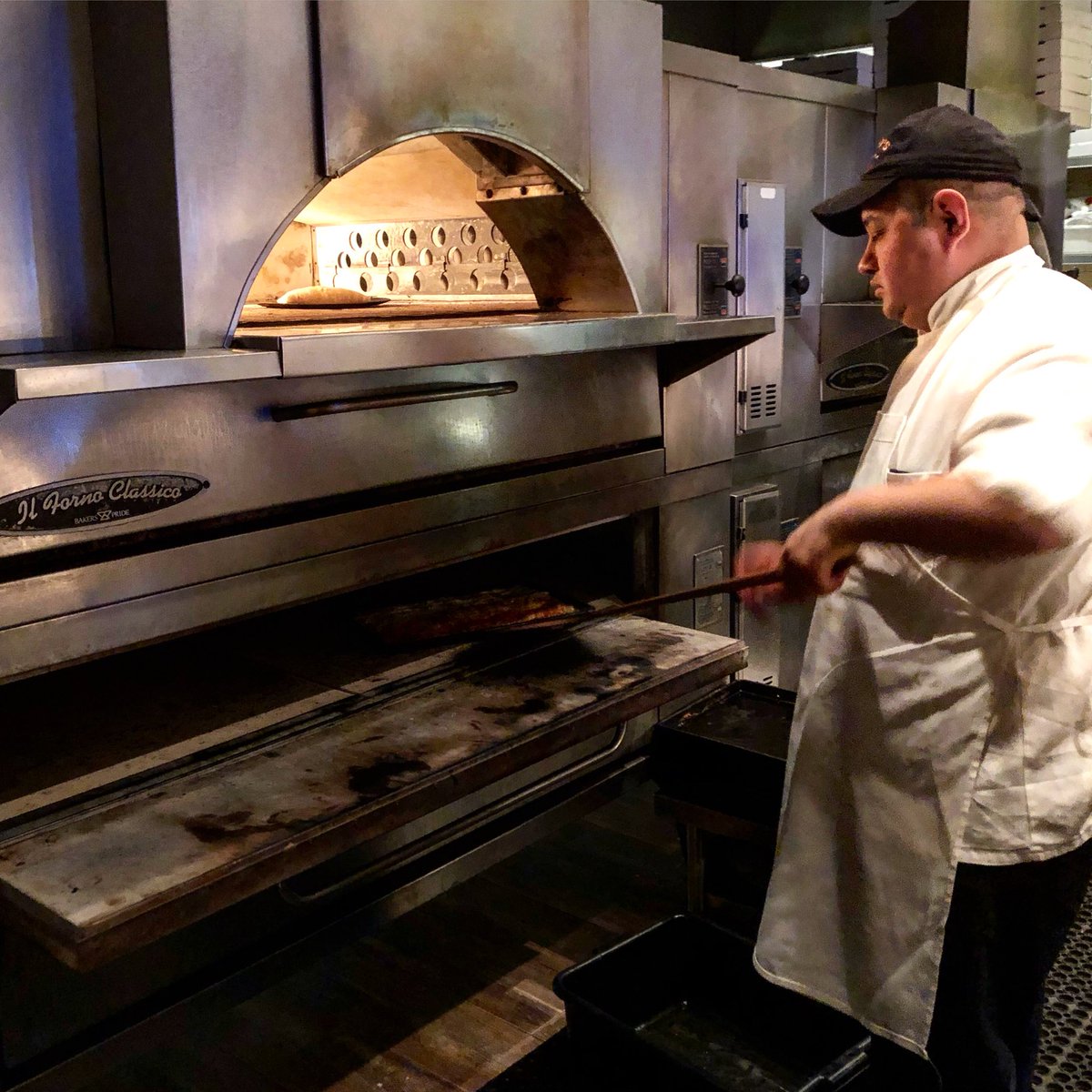 HarrysItalian's tweet photo. Dealing with the heat to bring you Grandma’s old-fashioned square pizzas! #harrysitalian #oldfashionsquarepizza https://t.co/B4Wf5qqoEz