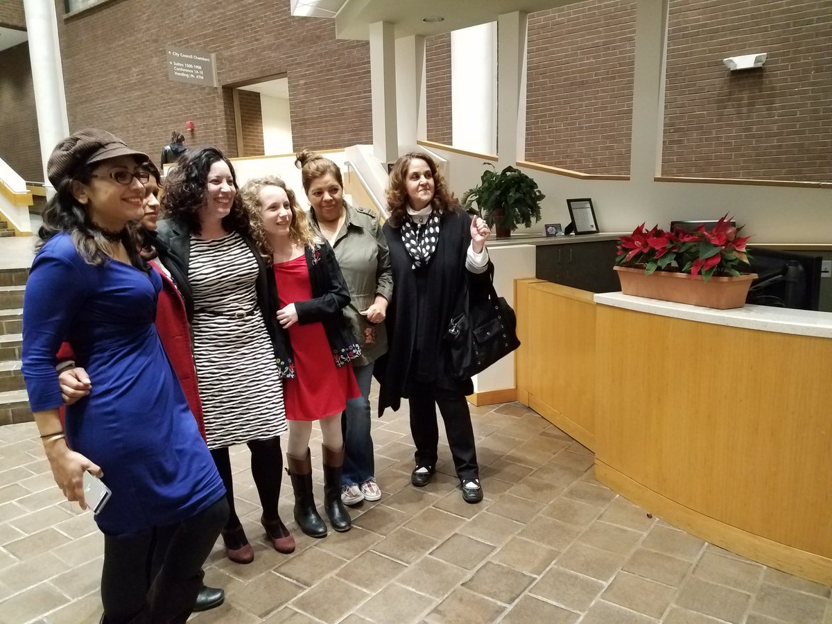 Just appointed <a href="/CityofDurhamNC/">CityofDurhamNC</a> Council member Javiera Caballero, in striped dress, will be sworn in at 7 p.m.