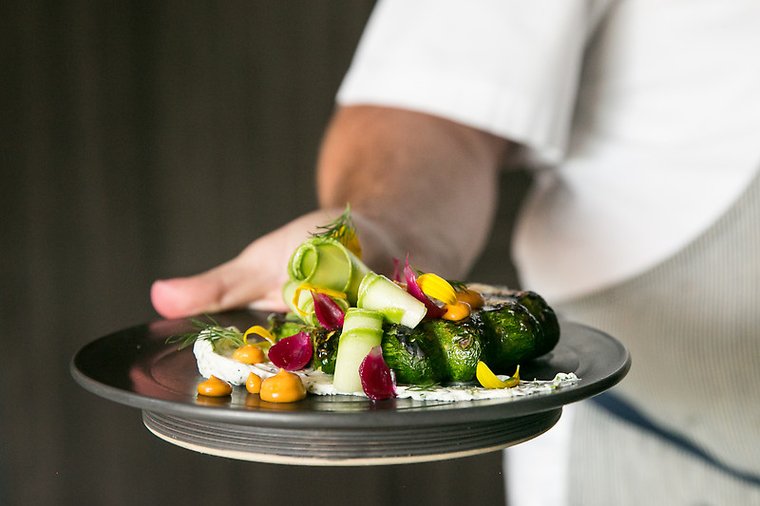At <a href="/juniperaustin/">Juniper</a>, Chef Nic Yanes' cured and grilled pattypan squash is a smoky-fresh #vegetarian steak. bit.ly/2DzblAn