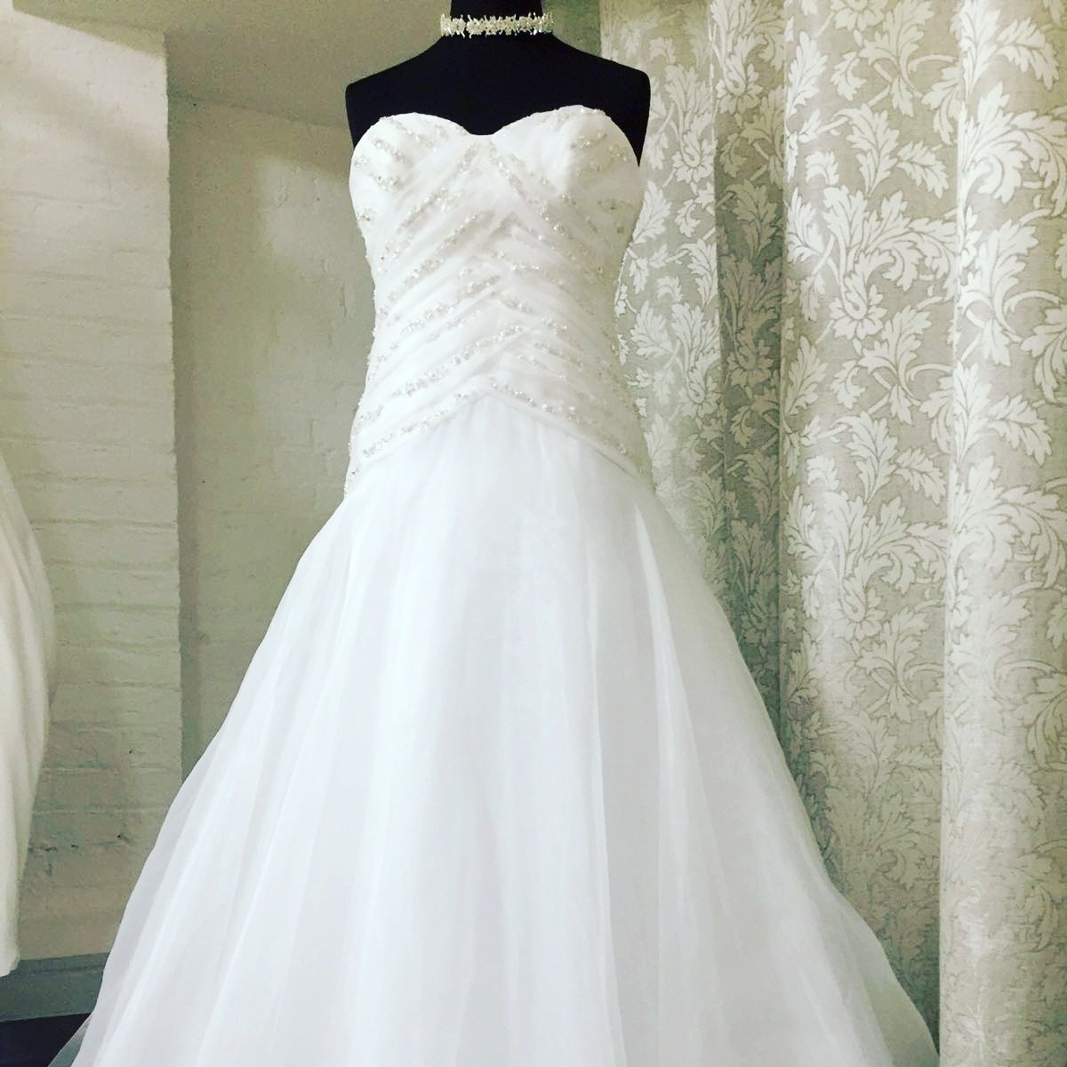 It's our  Dress of the week. This stunning Benjamin Roberts dress is only £250 in our sale! Book an appointment to see if you can grab a bargain with us #jandjbrides #exsample #sale #bridesonbudget #worcestershirewedding