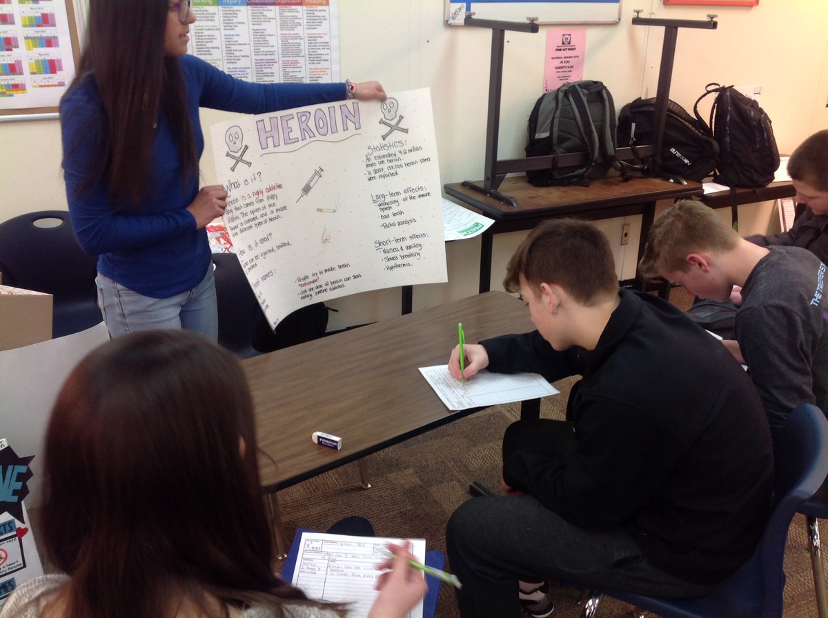 MrsSchubs's tweet photo. Student sharing out Drug posters in class during a gallery walk & audience taking Cornell notes -student voted they liked this type of presenting over traditional! #studentstakingownership #ThirdhourHealth https://t.co/jtQQE4MJW1