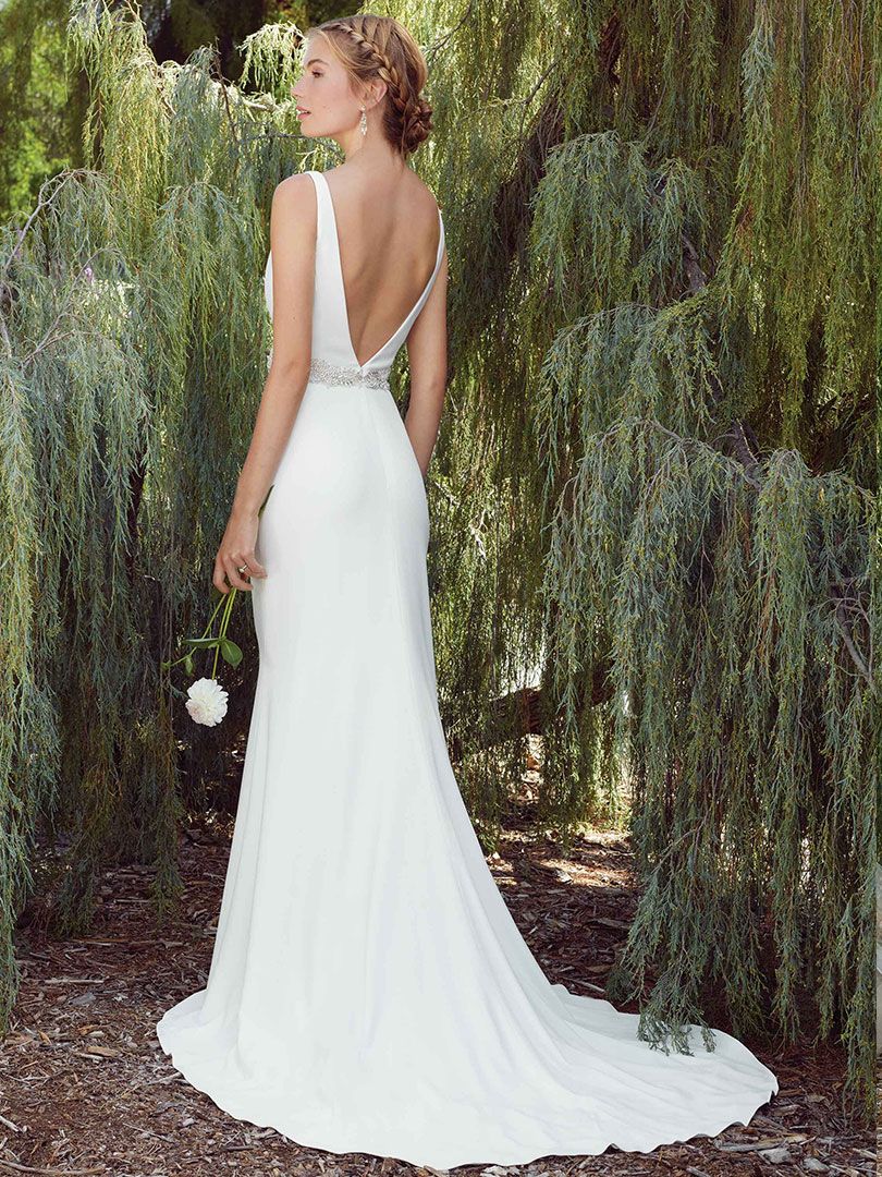 #Style2268 Delphinium drips with modern sophistication with her clean and simple stretch Georgette silhouette, topped with a sparkling belt line and flirty V-neckline. ow.ly/Eka830hyRnS