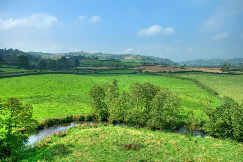 CPRE's tweet image. The amount of land lost to housing development from our treasured Areas of Outstanding Natural Beauty has increased five-fold since 2012 - an outrageous national betrayal.  bit.ly/2rjNXVo
