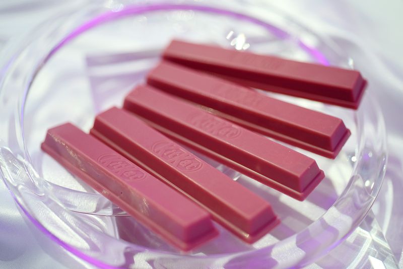 business's tweet photo. Nestle launches new KitKats made with ruby chocolate - the first new type of natural chocolate in 80+ years https://t.co/IfP88Be1fT https://t.co/rJ5B6ODMHi