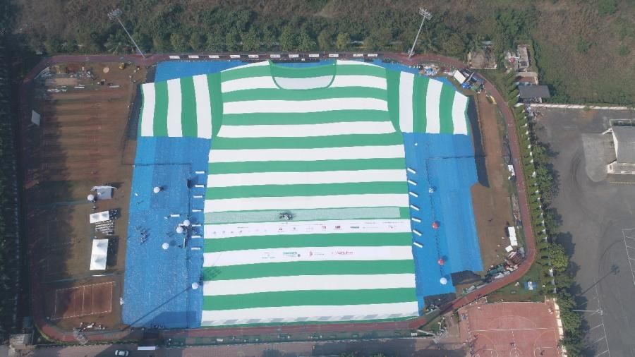 Packaging waste you can wear. Indian plastics organization Plastindia Foundation creates the world’s largest T-shirt from 2000,000 recycled PET bottles to raise awareness around recycling. buff.ly/2DLJ35V #recycling #WasteManagement #India <a href="/packagingworld/">Packaging World</a>