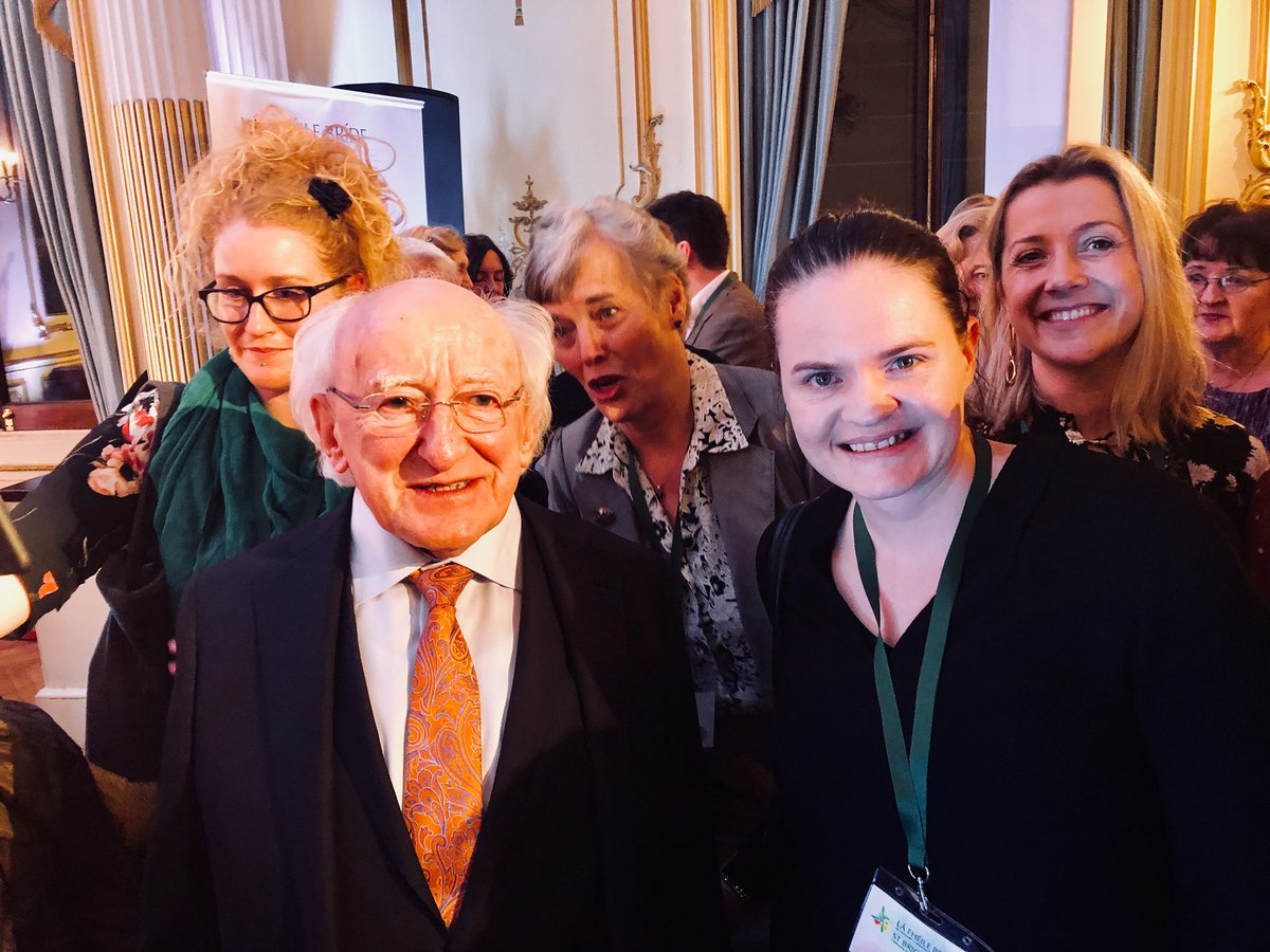osullisi's tweet photo. Truly honoured to have met (and photobombed!) the @PresidentIRL Mr Michael D. Higgins at the #StBrigidsDay celebrations. Thank you to all @IrelandEmbGB in London for a wonderful event celebrating Irish women. #lifeatfenergo #londonirish https://t.co/BtbOStE9dx