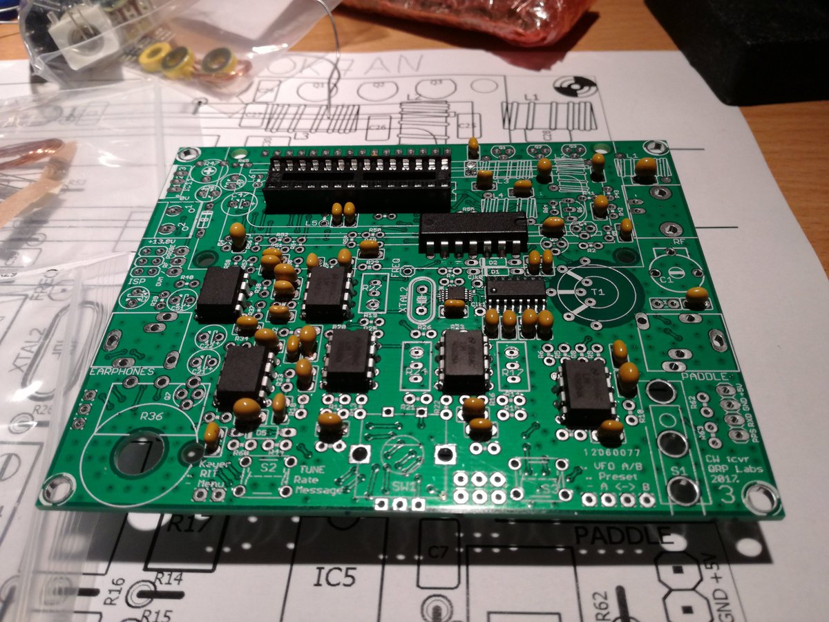 ok7an's tweet photo. Building QCX transceiver from @qrplabs with my youngest son. Capacitors and integrated circuits already soldered, we will continue on the weekend. #hamradio #morsecode #qrp https://t.co/GGkSPRLwBk