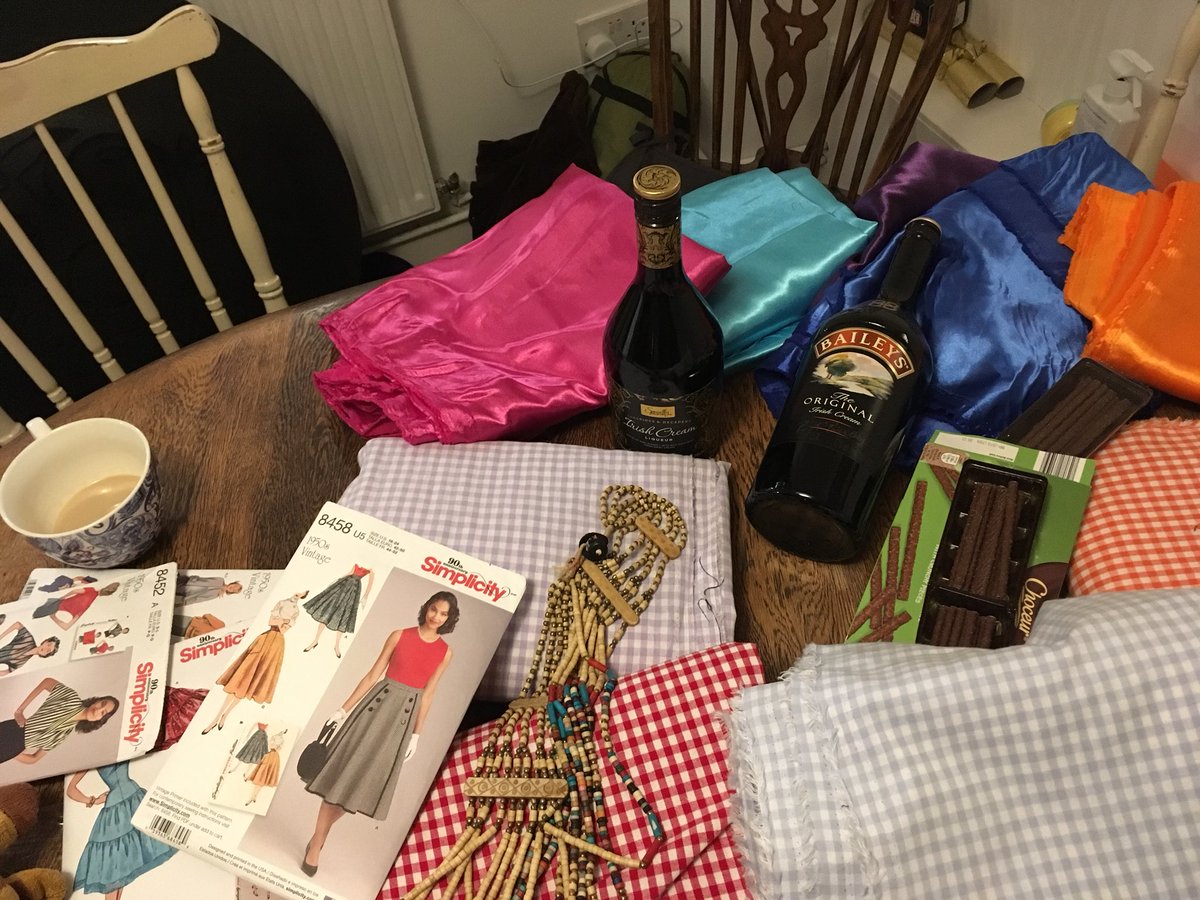 wymsicals's tweet photo. Cutting out costumes with the help of Baileys! #whatcouldpossiblygowrong #kansasland #curtains #thattaway https://t.co/FZti7sKDRT