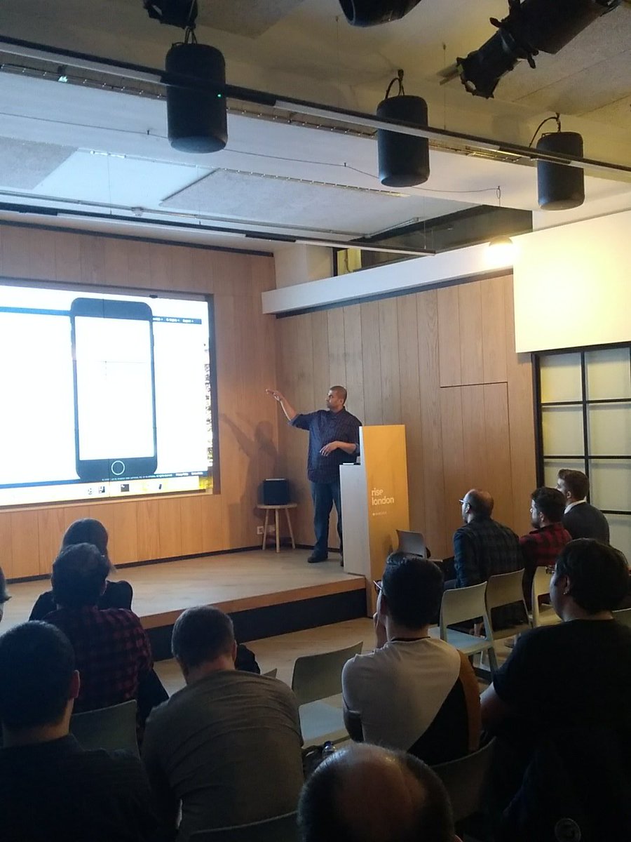JohnSotiro's tweet photo. Our @trunomi CTO @ammaskartik taking us through the art of using react mobile, JavaScript, and aws lex and lamdas  to build bots and conversational UXs at the #jsmonthlylondon meetup at @ThinkRiseLDN https://t.co/eUPB5qhhbq