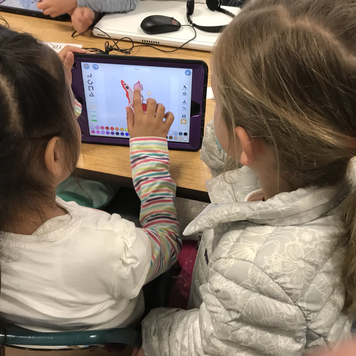Second grade students #PairProgramming on #scratchjr .  This week we are learning about #events and #parallelism #CSinSF #CSforALL