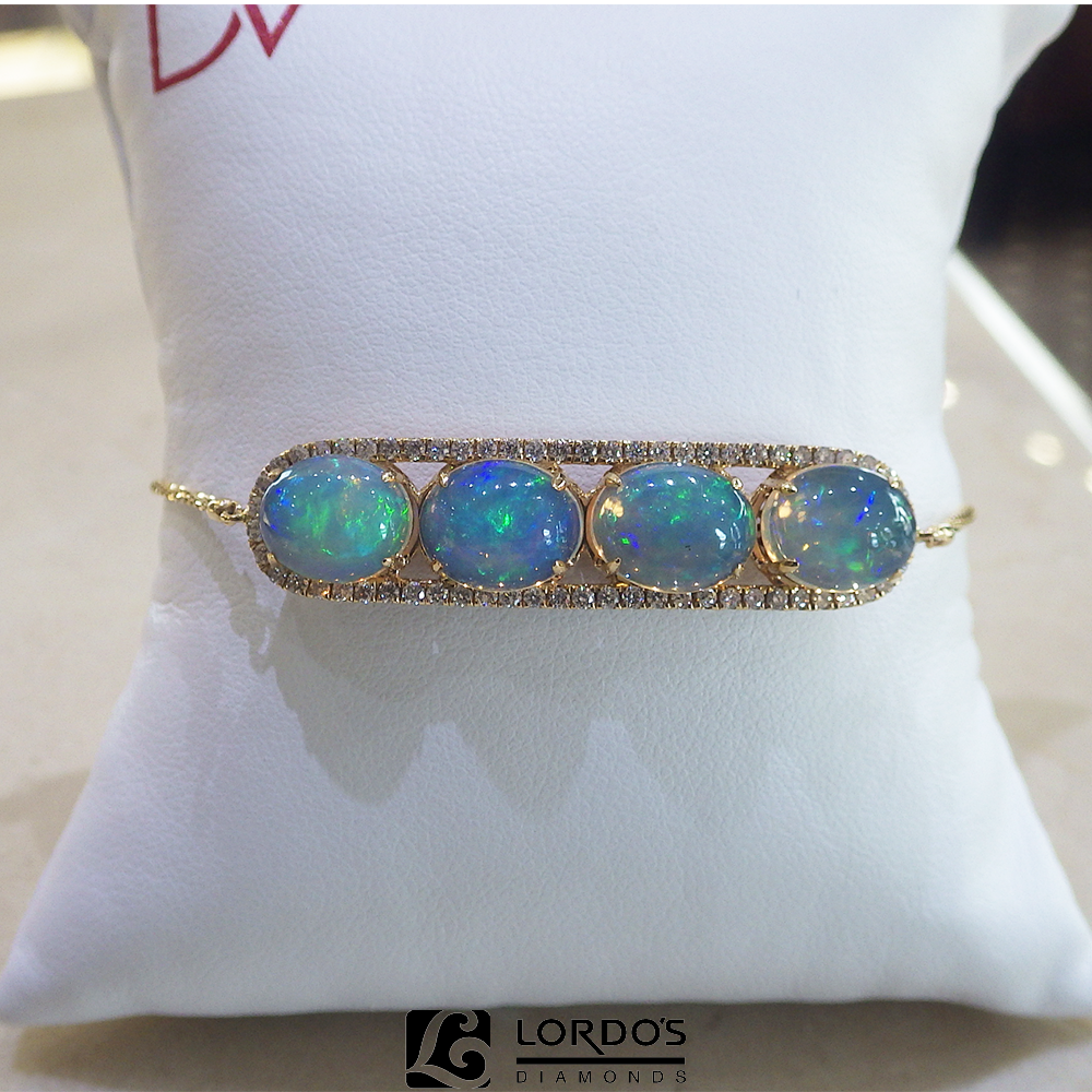 Dvani opal and diamond bracelet ~ Oh so much #jewelry to LOVE in #StLouis at Lordo's Diamonds bit.ly/2BtLd7t