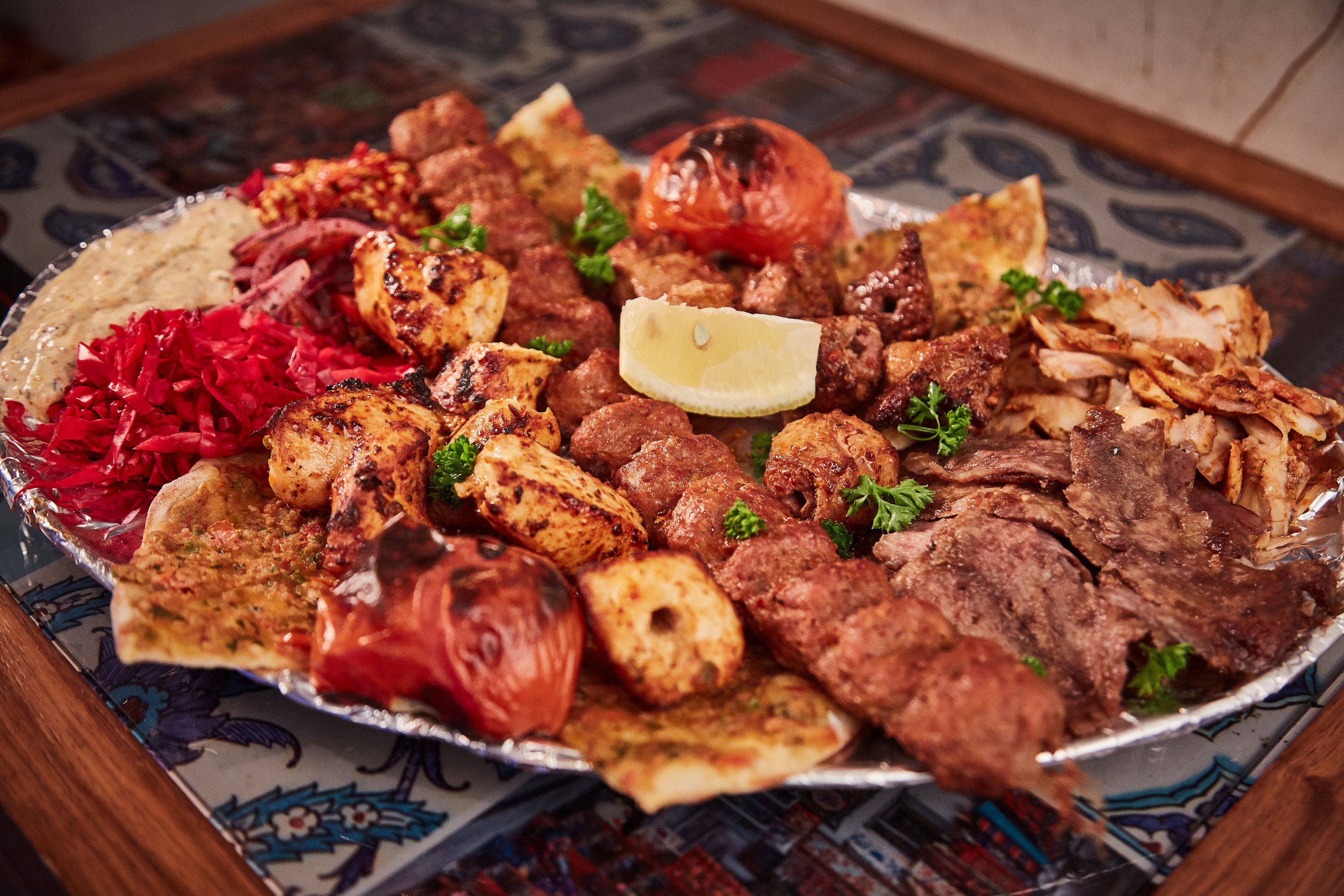 Sofra on Twitter: "Have you tried our mixed grill 2 or 4? Chargrilled over charcoal flames, generous portion accompanied by freshly baked Turkish flatbread, salads and famous signature