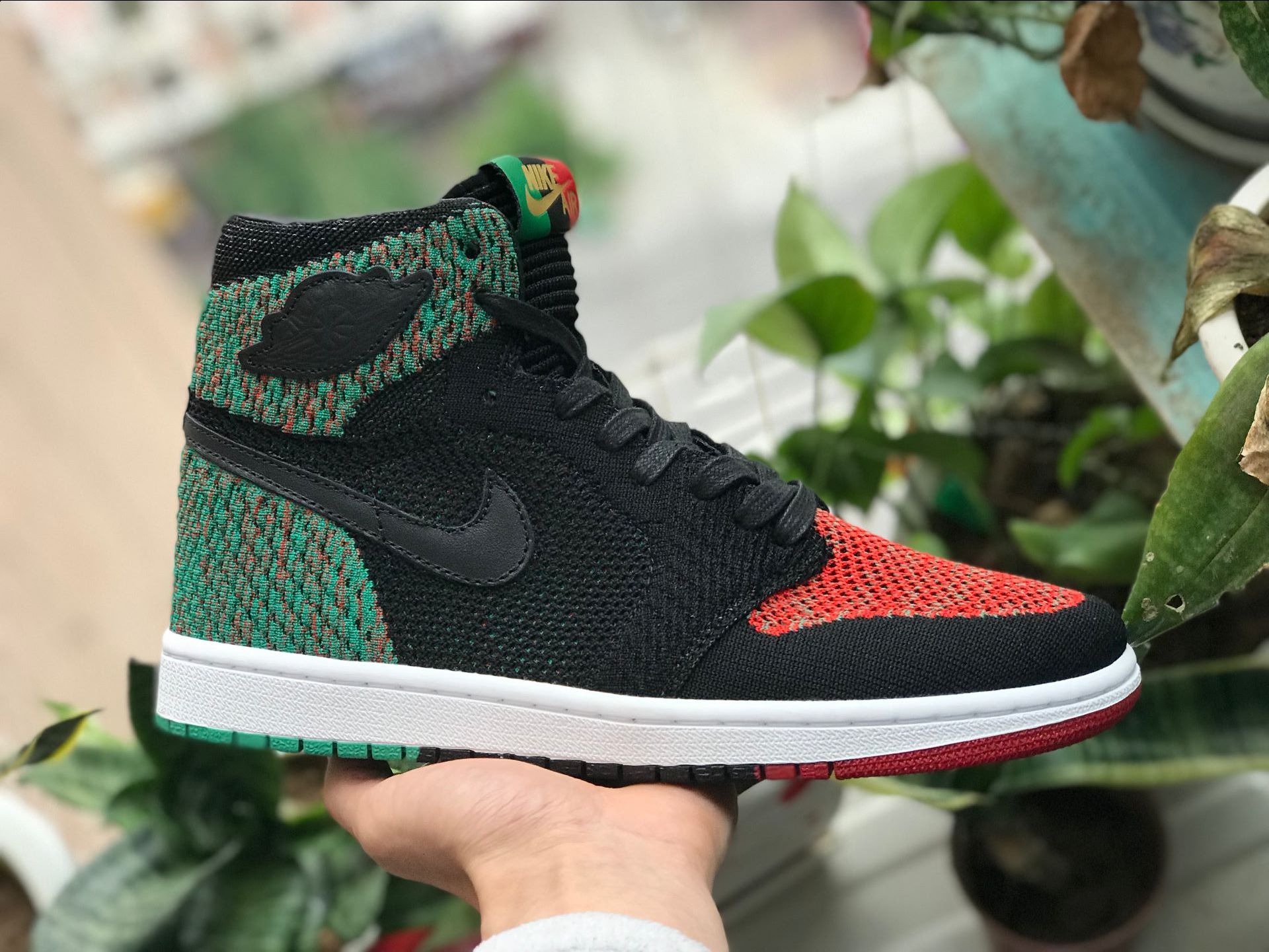 Jordan 1 flyknit black history best sale month