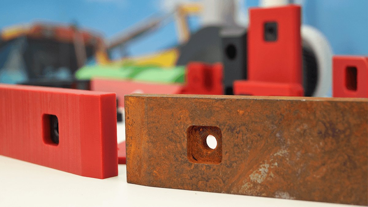 Nylube is our material grade with supreme wear resistance through its self lubrication.  It is also low weight and #corrosion resistant.  Here we have a traditional wear pad replaced with Nylube.  The Nylube pad is lighter, self lubricated and has no need for regular maintenance