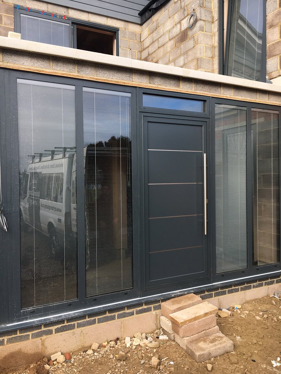 KAT K100 aluminium front door installed into new build by <a href="/optionsglazing/">Options Glazing Ltd</a>.co.uk . Great solution as K100 meets PAS24 as standard. It will look great when the render and garden is finished! ow.ly/USOY30i6K1l