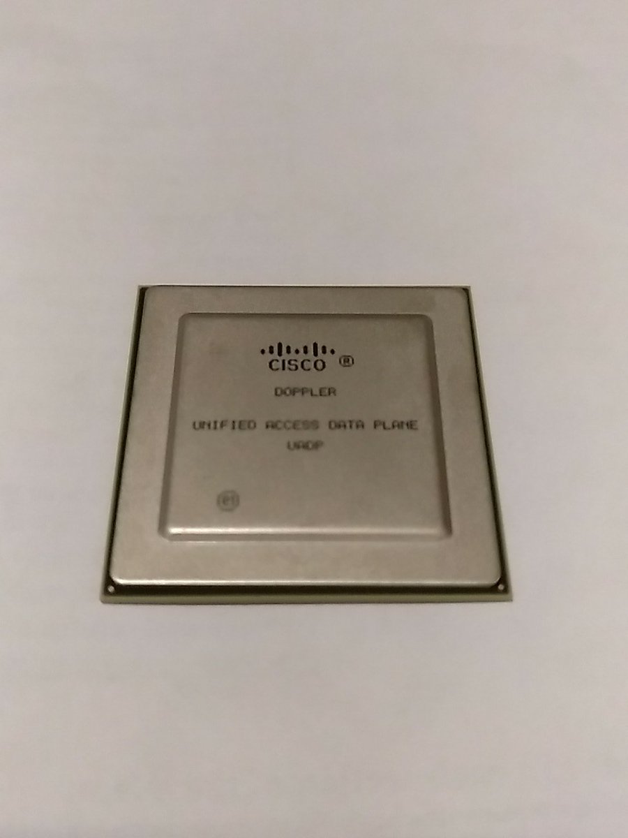 IPStorming's tweet photo. Tired of typical freebies? I got an ASIC UADP! Sameone used at Cat3850. Thanks to Muhammad Imam for the gift during his session on the new Cat9K! @CiscoChampion @CiscoLiveEurope https://t.co/k6d50rXs7f