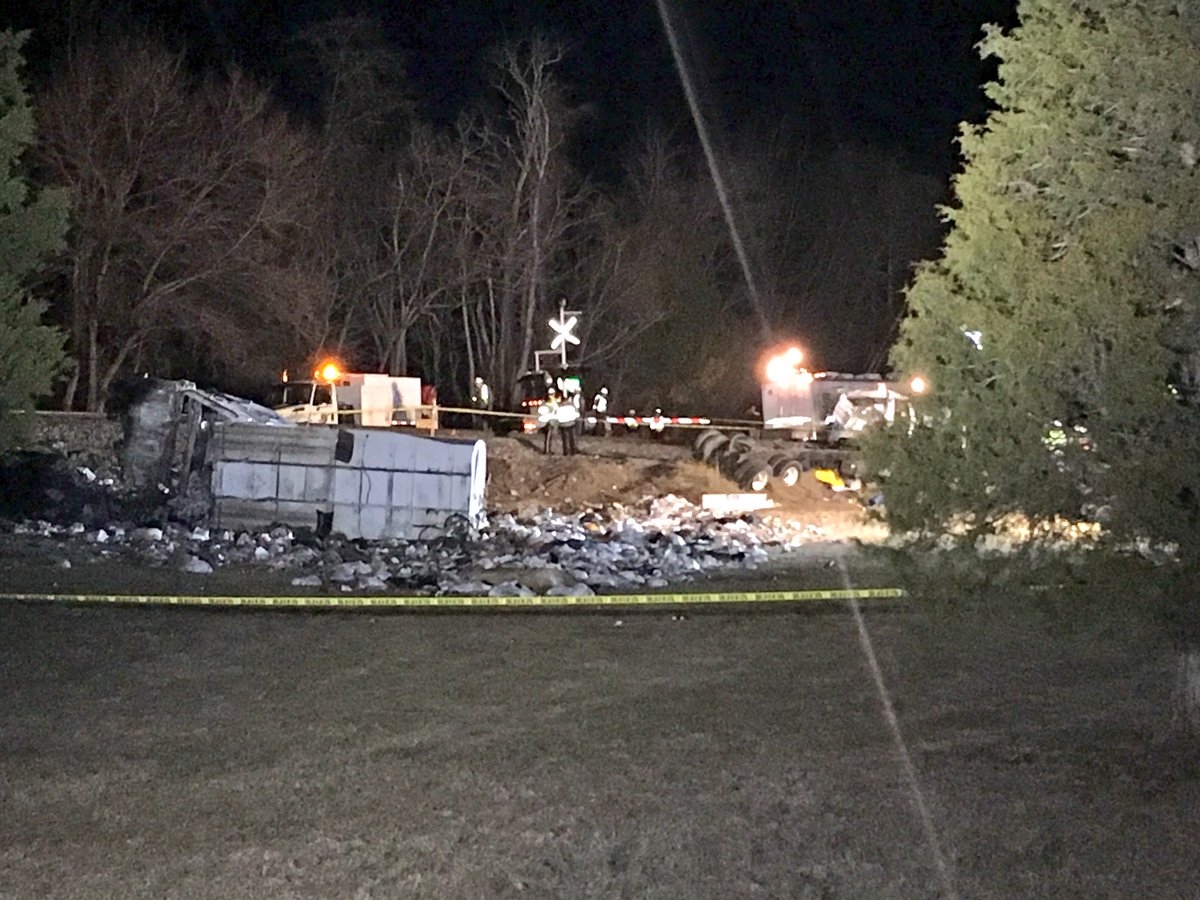FitzFox5DC's tweet photo. #Developing: We will have another update on the #GOPtrain Amtrak crash coming up on #5at630. Signs near the RR crossing warn trucks of a danger of bottoming out on the tracks. https://t.co/ARnxmYuSzY https://t.co/CT8rzoy52u