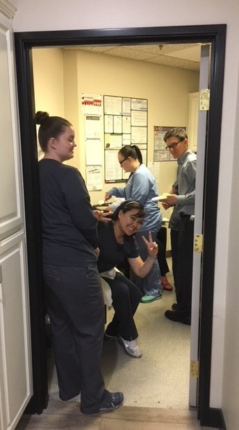 SmilesolutionsR's tweet photo. Vee's having a baby! Here she is at her baby shower/office potluck at our Rainbow location.  Congratulations, VEE! #newbaby #officepotluck #dentist https://t.co/2kCerRwPhk