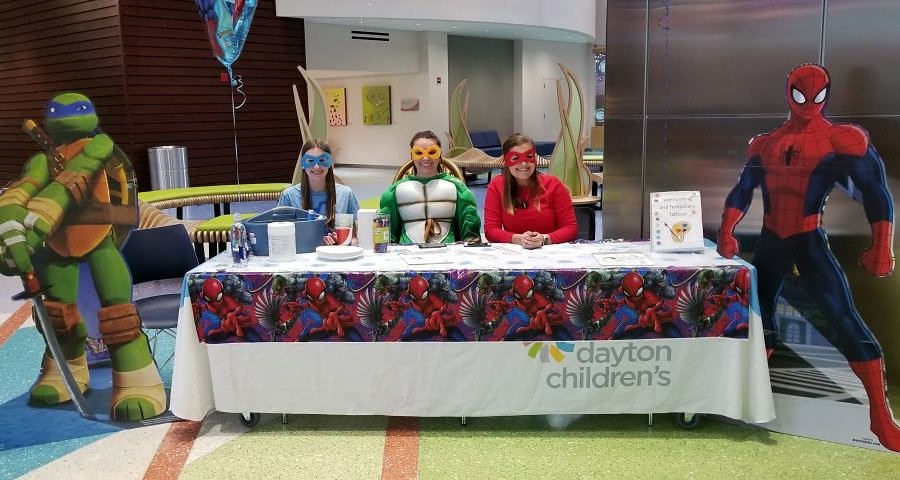 traceyhollenba2's tweet photo. Warms my heart that these Greeneview Volleyball players spent the afternoon face painting, giving temporary tattoos and just spending a few minutes with kids at Dayton Children's Hospital Super Hero Day! Love that they are giving back!β€
#flushotrequiredlimitedournumbers
#RamVB https://t.co/JezG9R7Yti