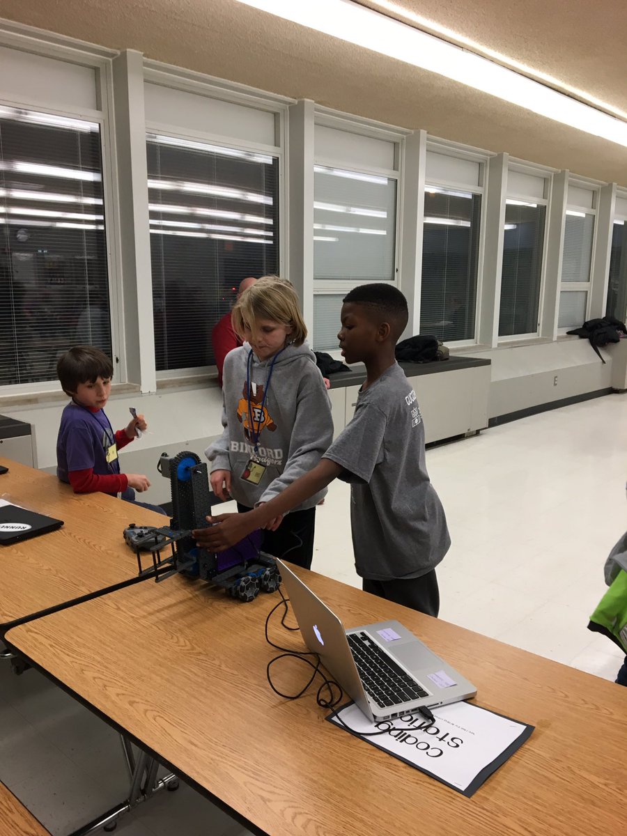 roboticsHP's tweet photo. It's not all about the competition. @roboticsHP shares coding skills with the a Binford Bot @TPF4YRobots #PhotobombChallenge https://t.co/S77GaoEZv4