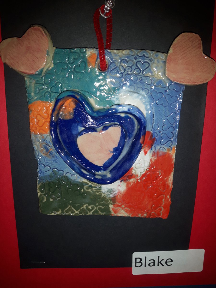 Every school should have a kiln so students experiment with different mediums of art.  Here's another Kindergarten art project.