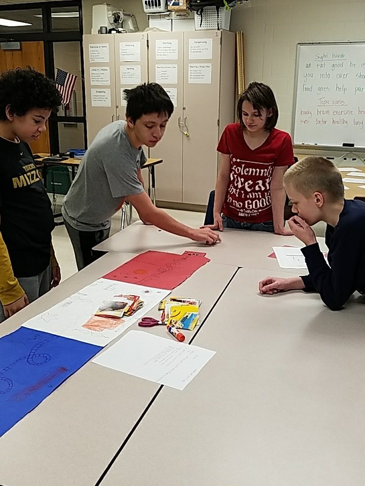 MelissaBiermann's tweet photo. These students are playing a game they designed and made for an assignment in Emily Pahmeyers class! #esmsbestyearever #essdexcels #esmsimpact https://t.co/7bFhTWdBPj