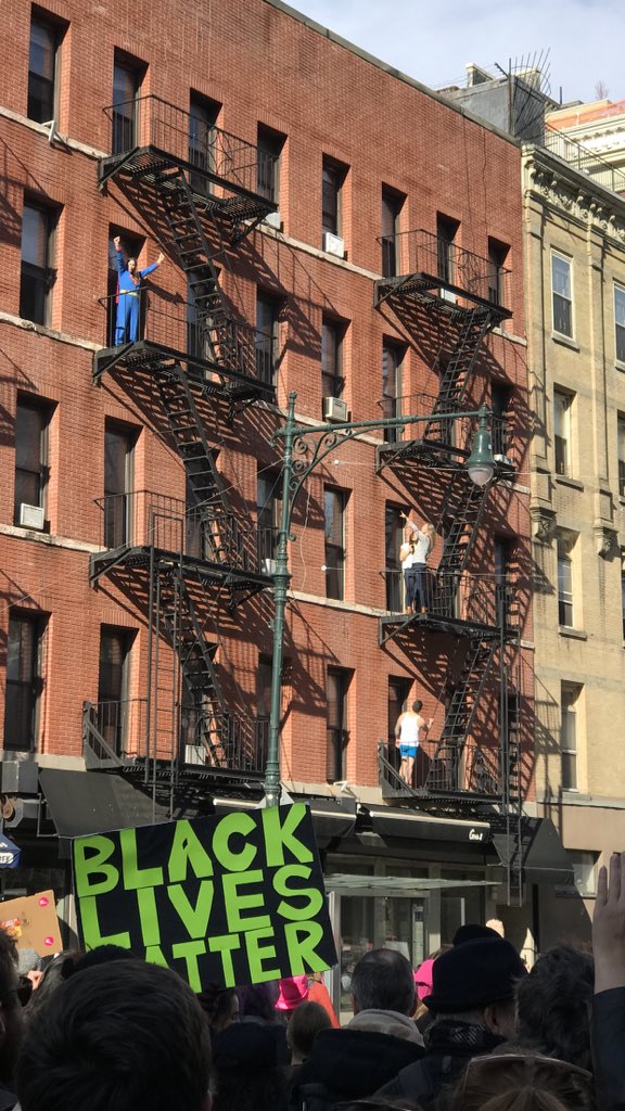 sadmonsters's tweet photo. That awkwardly symbolic moment when you're a dude in your underwear who thinks the Women's March is cheering for you, but they're actually cheering for Supergirl two fire escapes above https://t.co/tXttIQdQiX