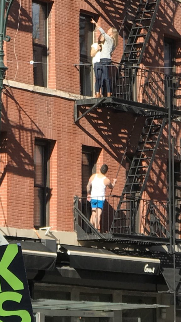 sadmonsters's tweet photo. That awkwardly symbolic moment when you're a dude in your underwear who thinks the Women's March is cheering for you, but they're actually cheering for Supergirl two fire escapes above https://t.co/tXttIQdQiX